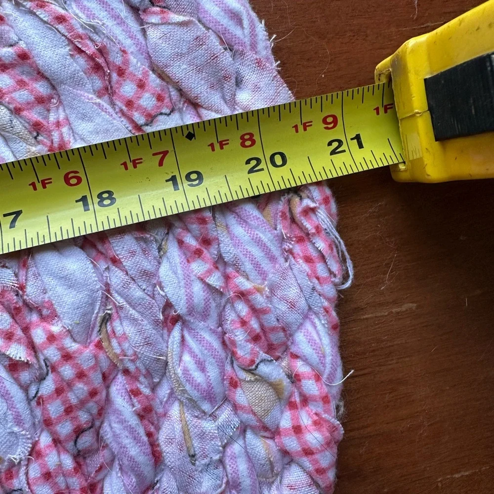 Round Pink and White Braided Rug